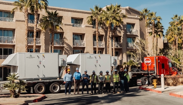 American Cool Team With Commercial Hvac Units On Truck Before Installation